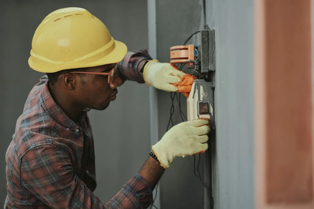 Appliance Repair Technician servicing kitchen appliances